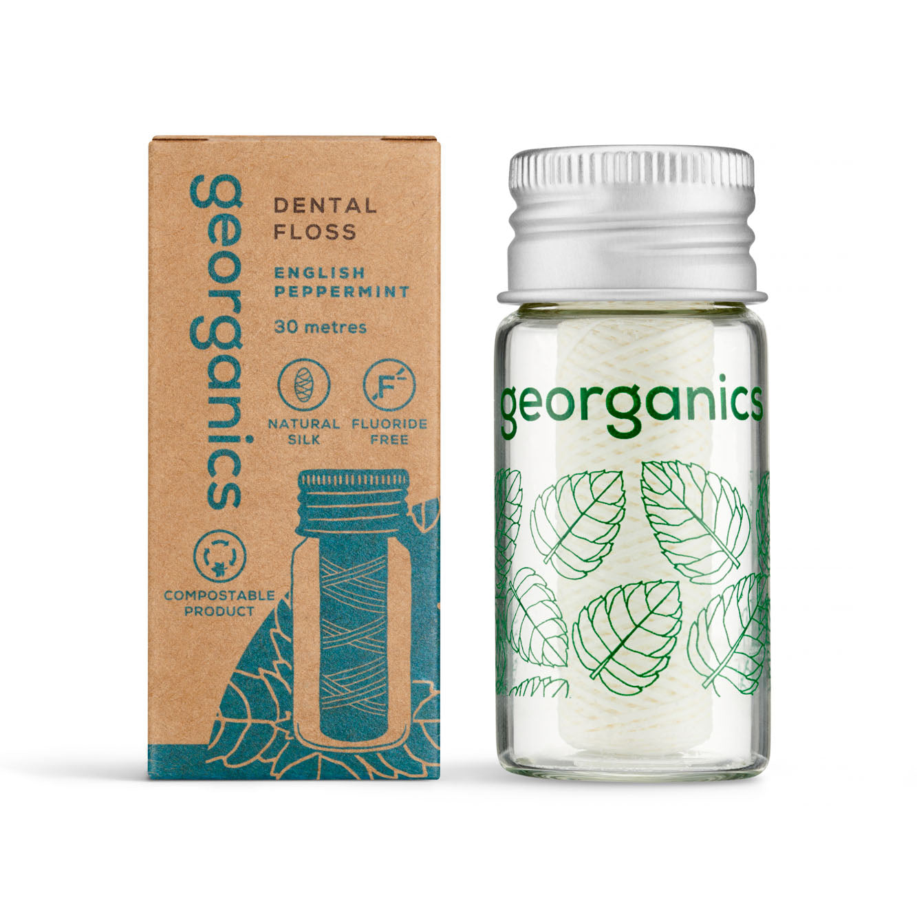 Georganics english peppermint dental floss packaging with glass container and cardboard box on a white background