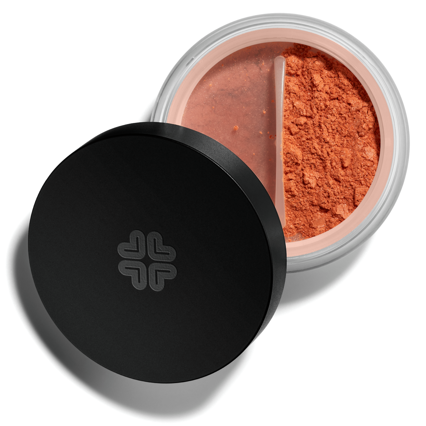 Juicy peach mineral blush with black lid, on a white background