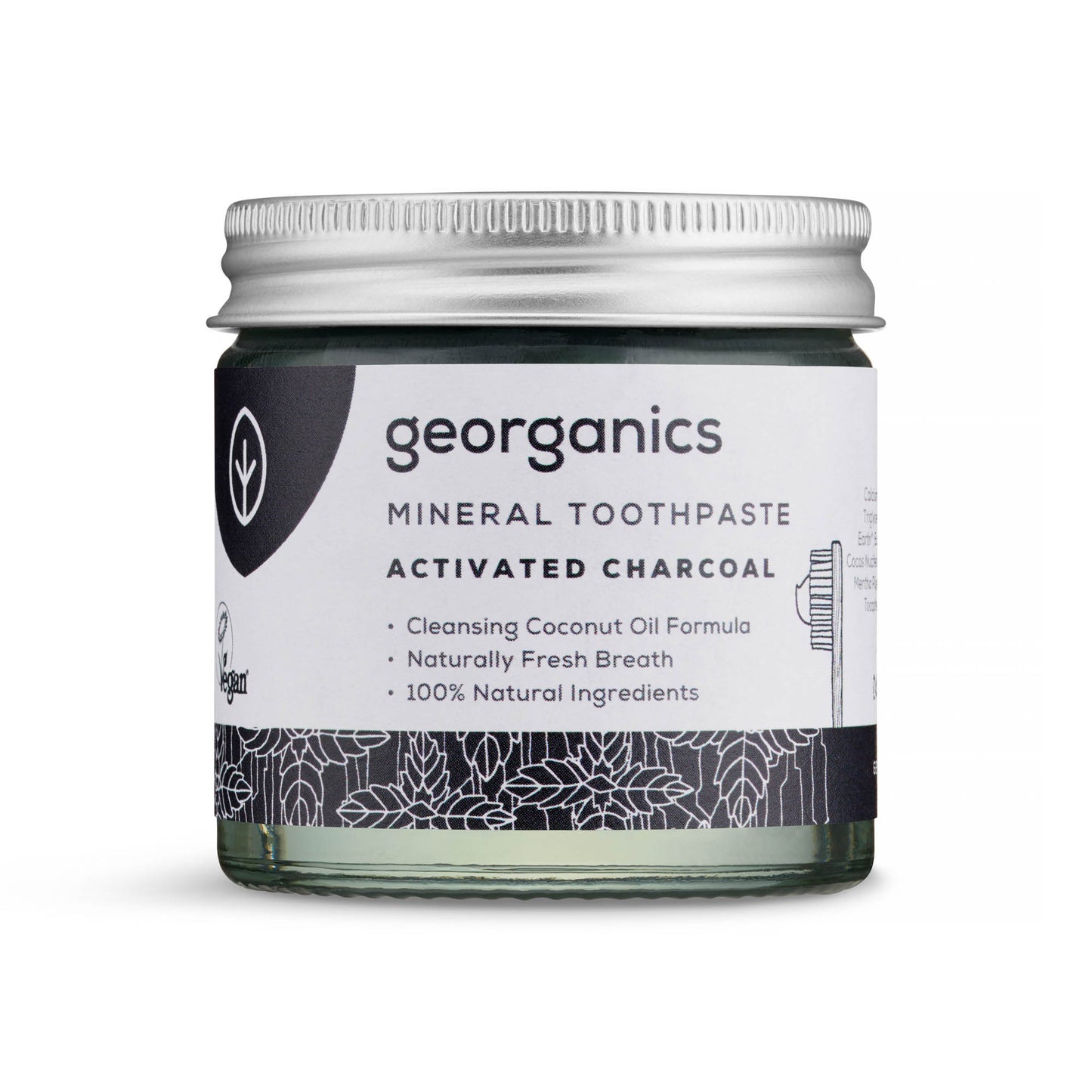 Georganics activated charcoal toothpaste jar on a white background