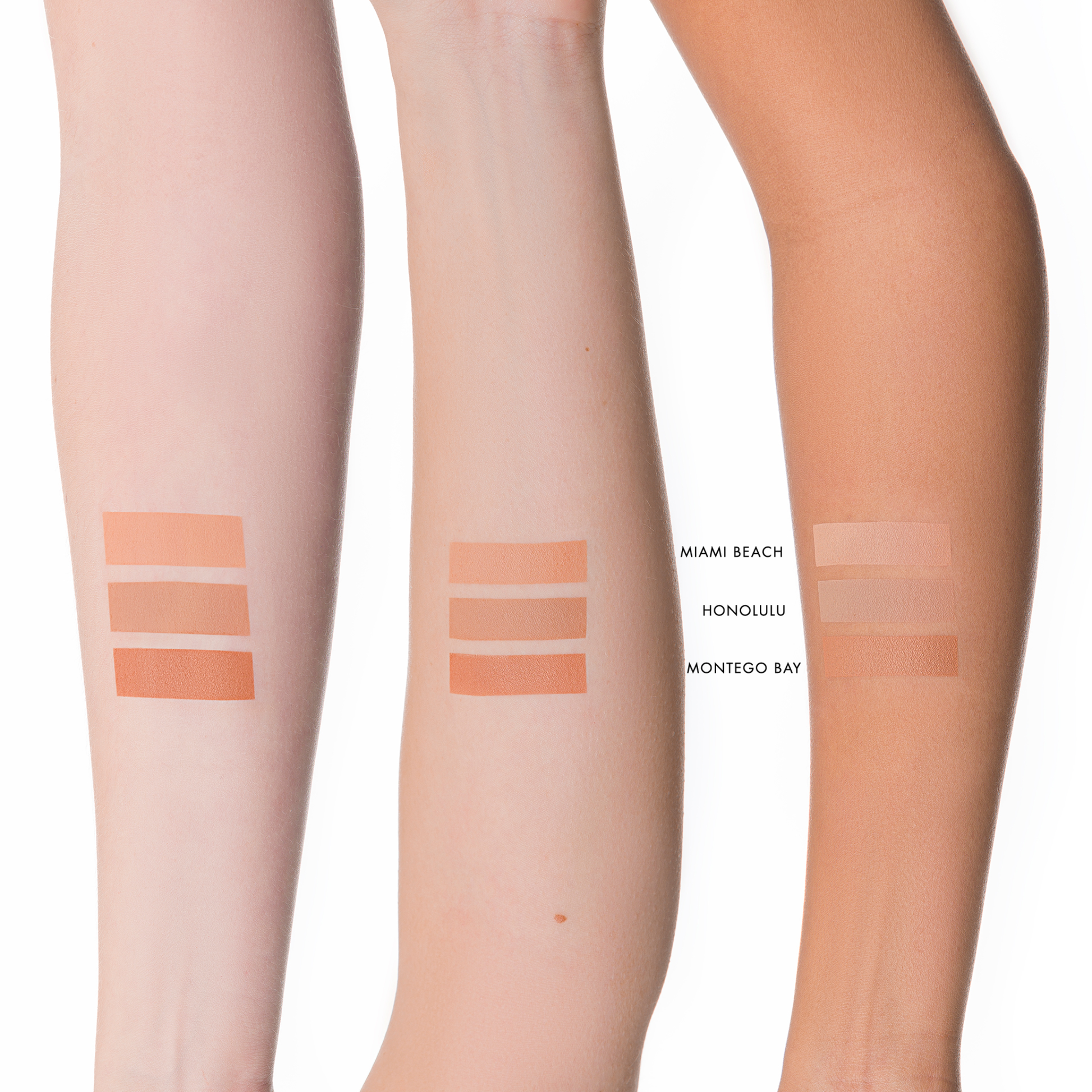 Three arms with different tanning shades displaying Lily Lolo pressed bronzer shades on a white background