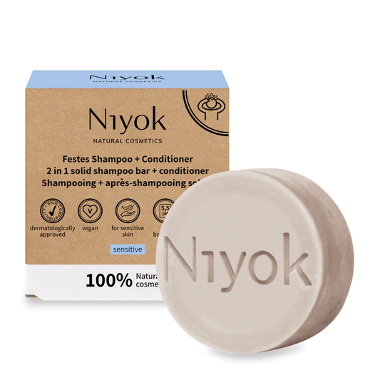 Niyok sensitive solid shampoo and conditioner bar with packaging on a white background