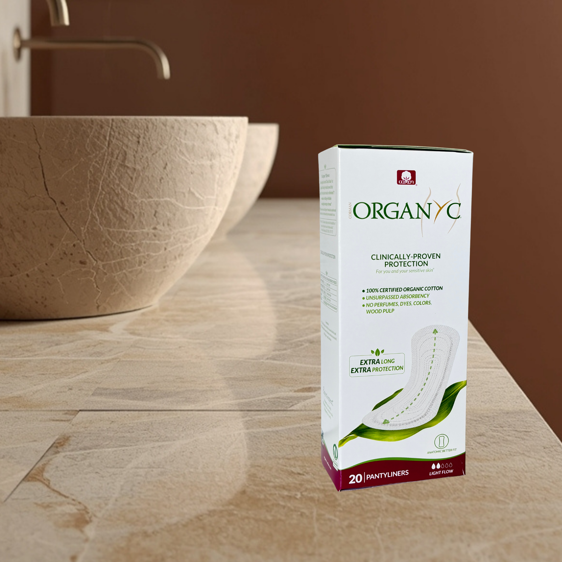 Organyc panty liner maxi packaging on a bathroom counter