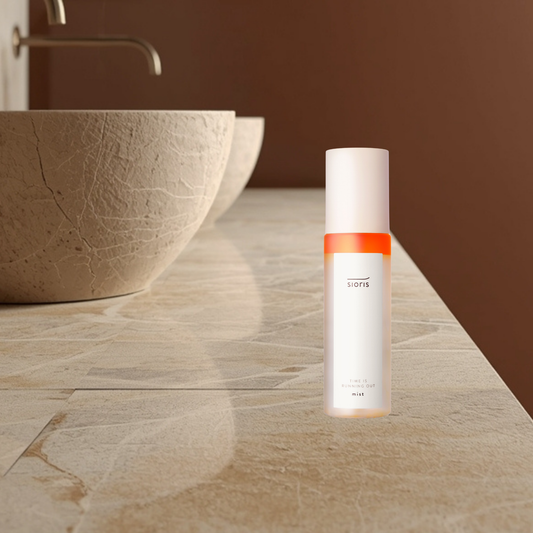 Sioris Time Is Running Out Mist on a bathroom counter